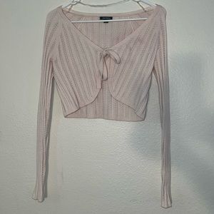 Cream colored top with tie front